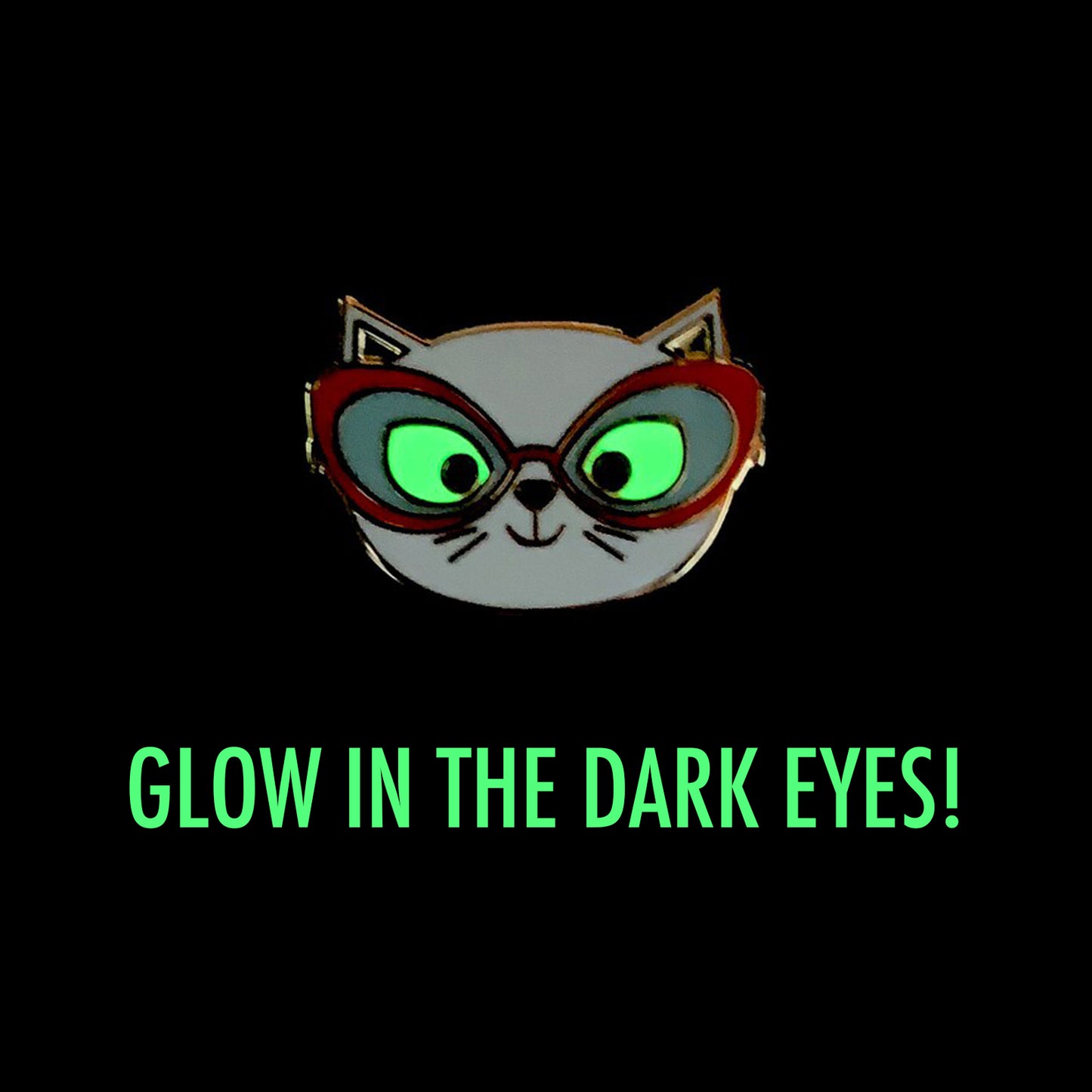 the cat pin with glow in the dark green eyes