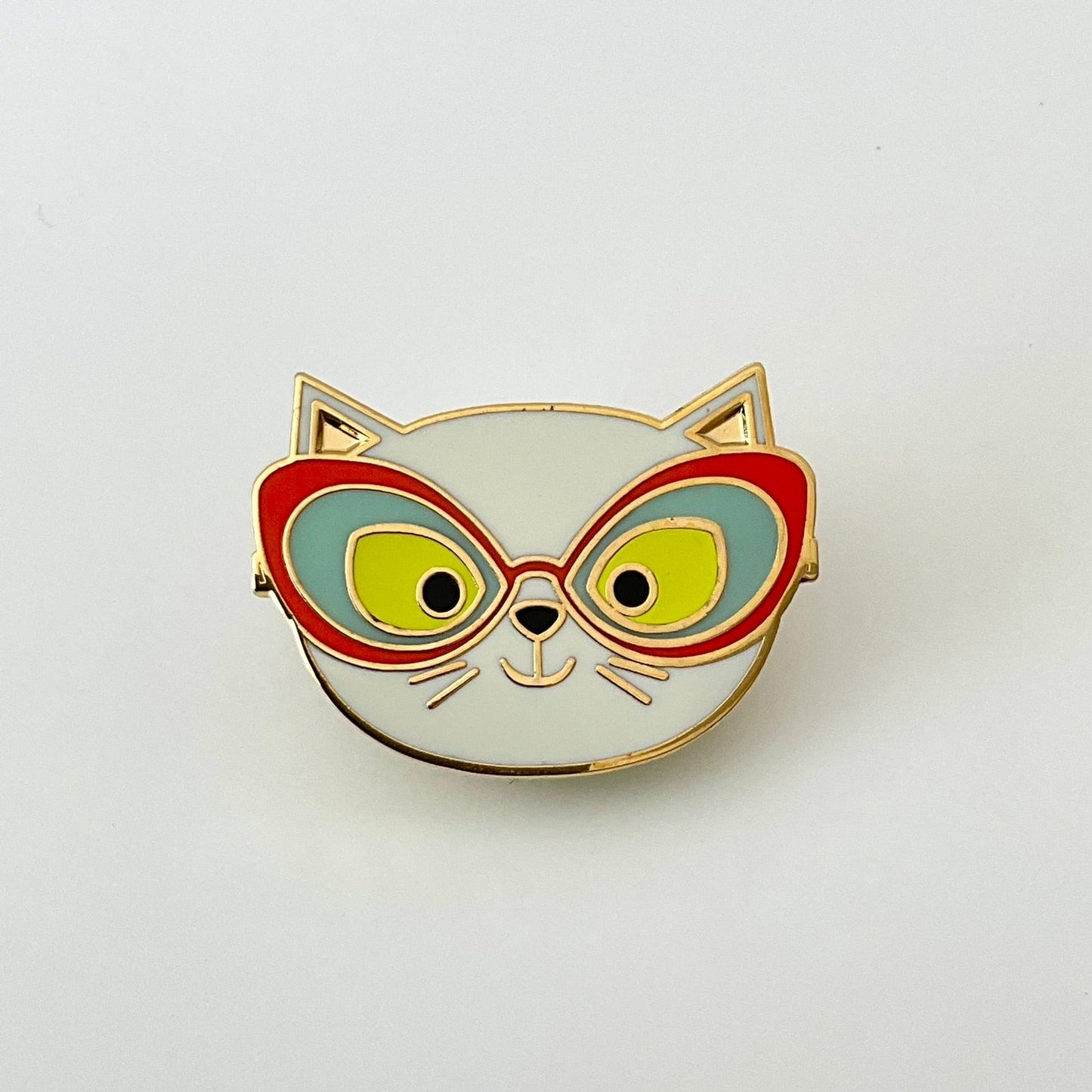 a white cat wearing cat glasses