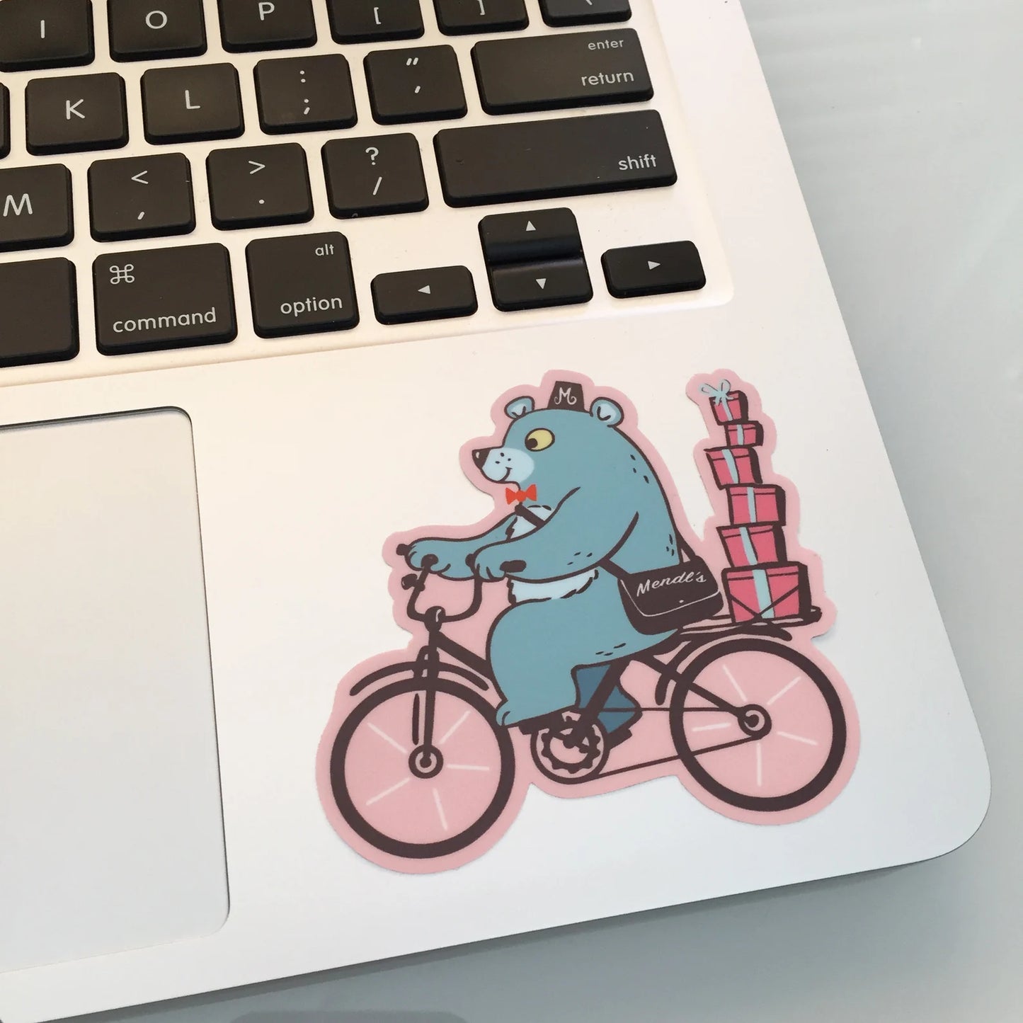 Bear on a Bike delivering Mendls Pasteries - Pastel Pink & Blue - STICKER