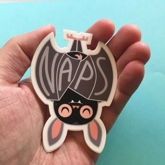 a cute bat hanging upside down with the word naps in its wings