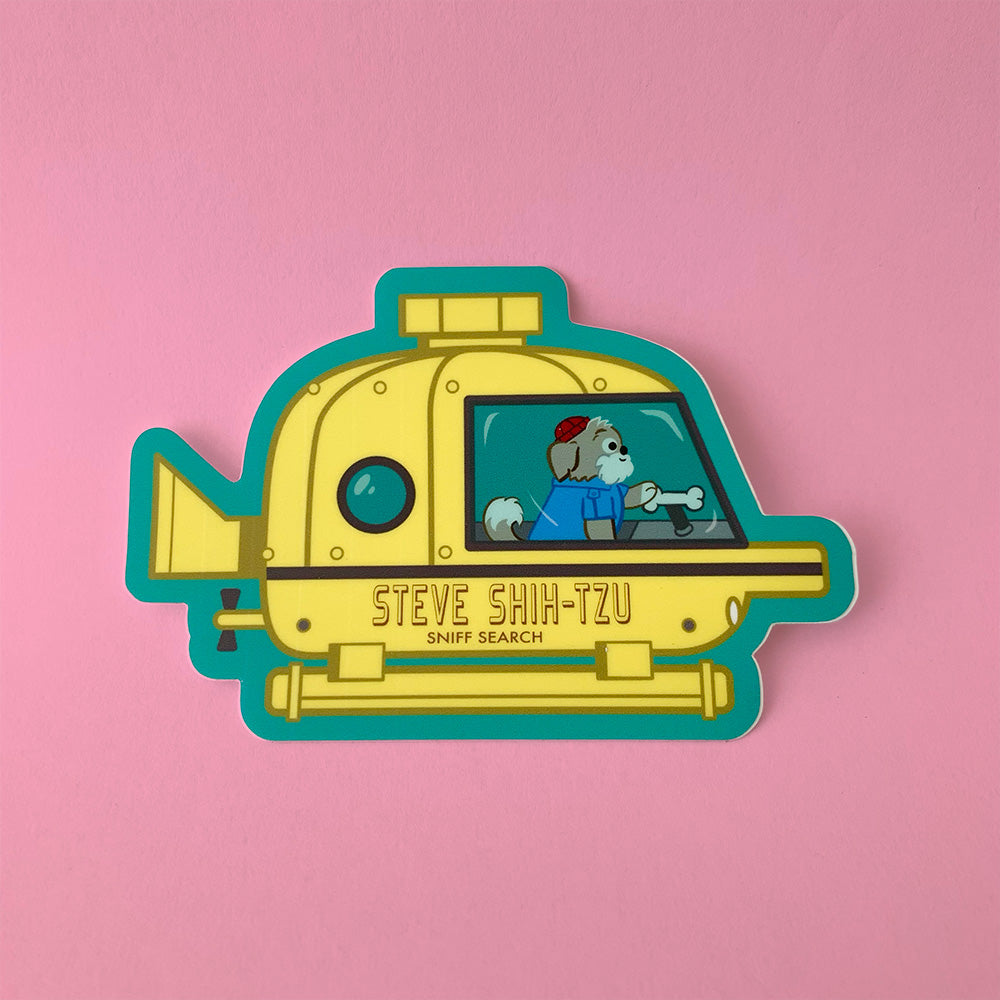 sticker of a dog driving a submarine