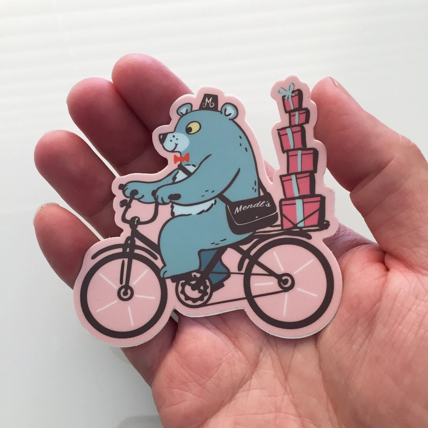 Bear on a Bike delivering Mendls Pasteries - Pastel Pink & Blue - STICKER