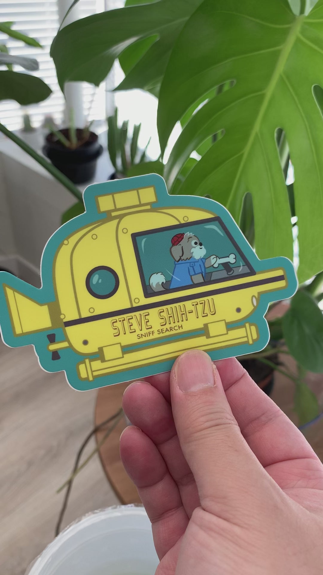 video of sticker of a dog driving a submarine